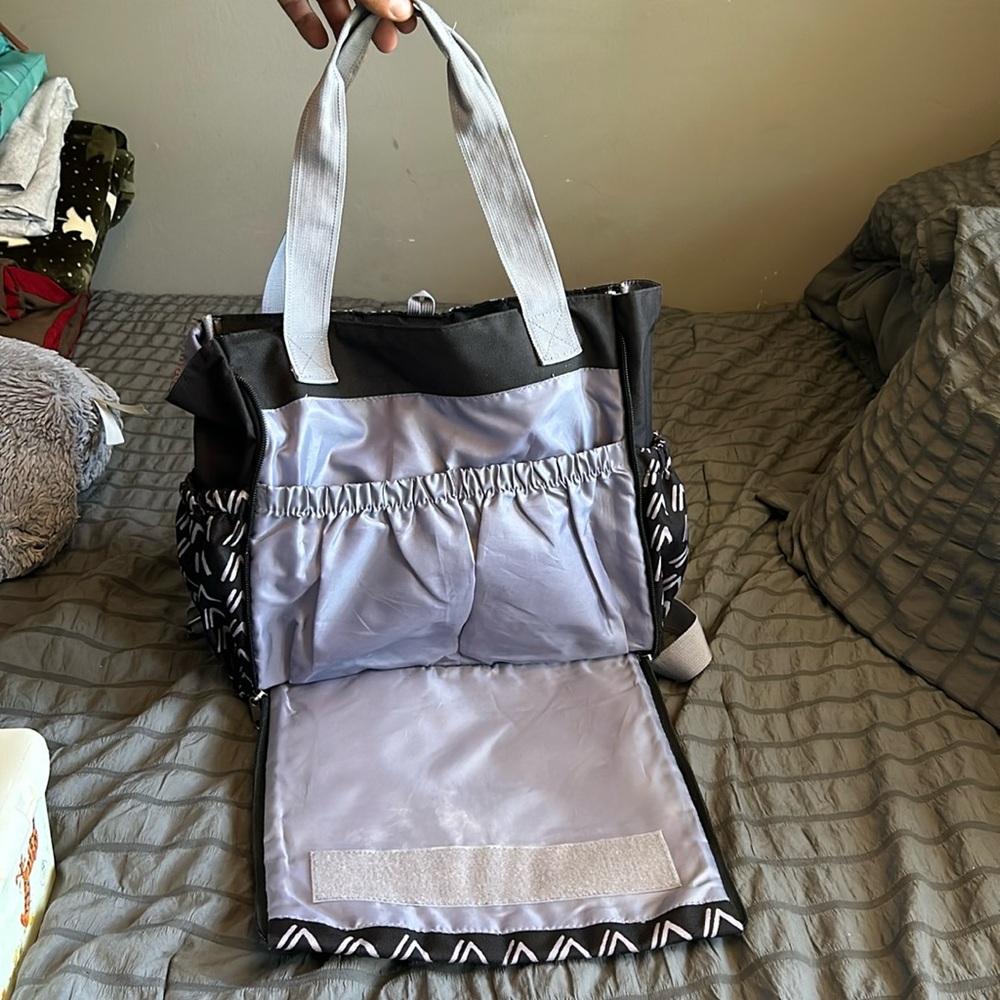 Diaper bag, it has a lot of room and extra pockets for anything.